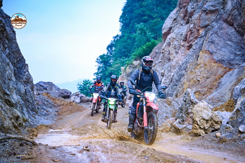 Mixed terrain motorcycle touring in Vietnam with paved roads and light off-road trails